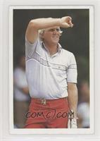 Greg Norman (Shielding eyes)