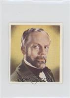 Paul Muni as Louis Pasteur [Good to VG‑EX]