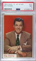 Gig Young [PSA 7 NM]