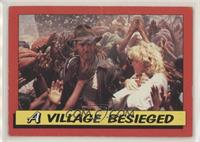 A Village Besieged [EX to NM]
