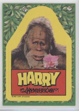 1987 Topps Harry and the Hendersons - Stickers #18 - Harry holding flower