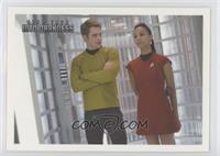 Kirk enters the turbo lift with Uhura…