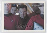 Back aboard the Enterprise, a team of...