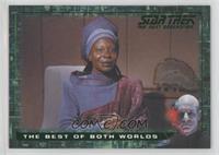In the Captain's Ready Room, Guinan…