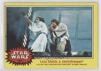 Leia blasts a stormtrooper