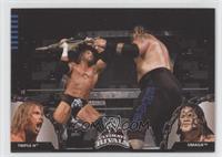 Triple H vs. Umaga