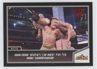 John Cena defeats The Rock for the WWE Championship