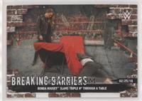 Ronda Rousey Slams Triple H Through a Table